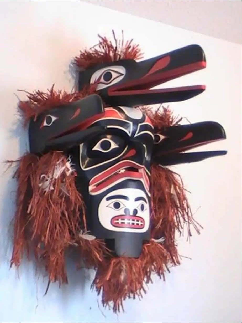 Multi-figure raven mask with cedar bark fringe